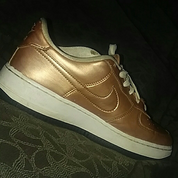 nike air force ones with gold